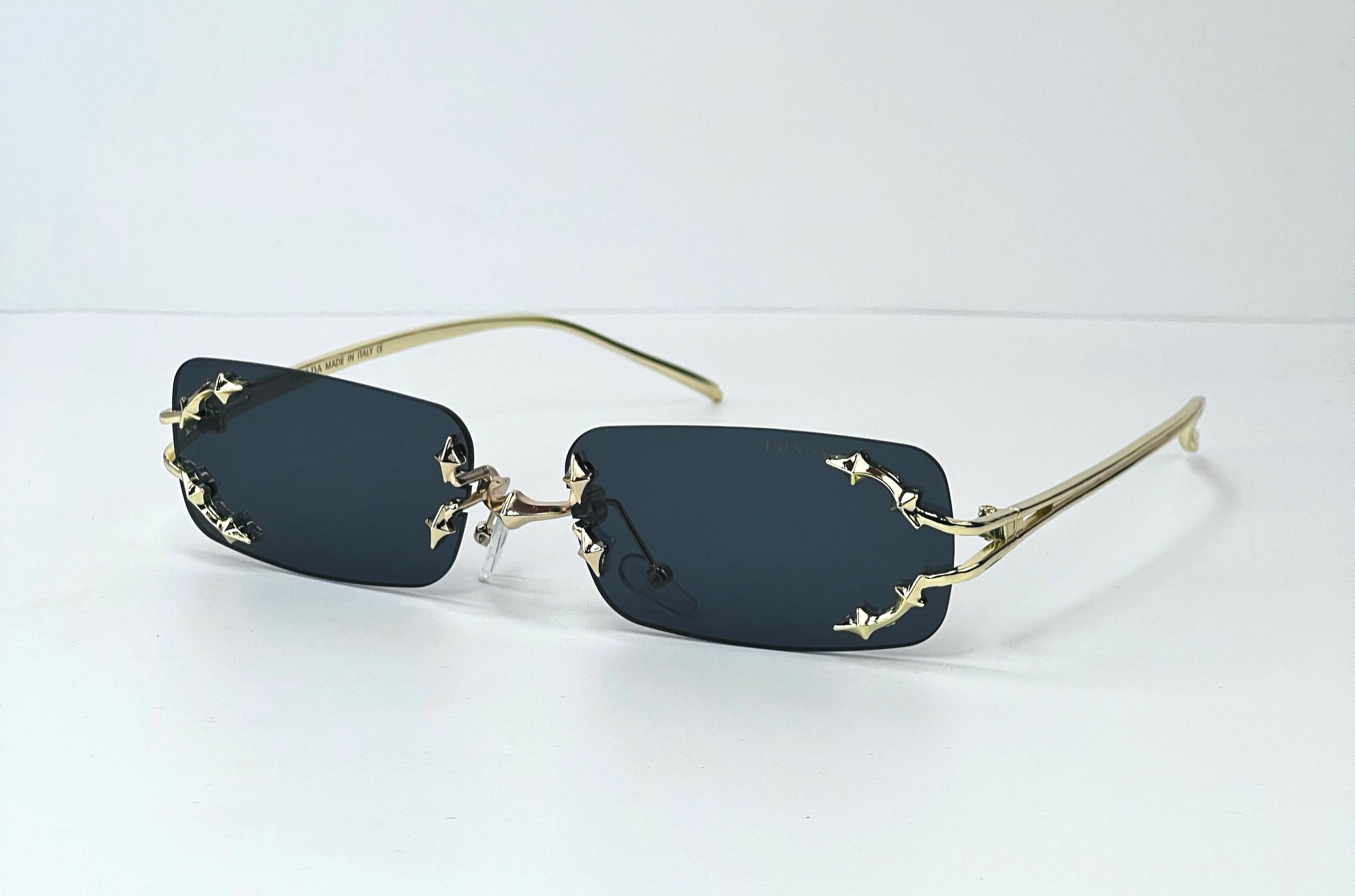 Prada metal rimless sunglass